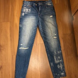 Distressed high rise girlfriend jeans
